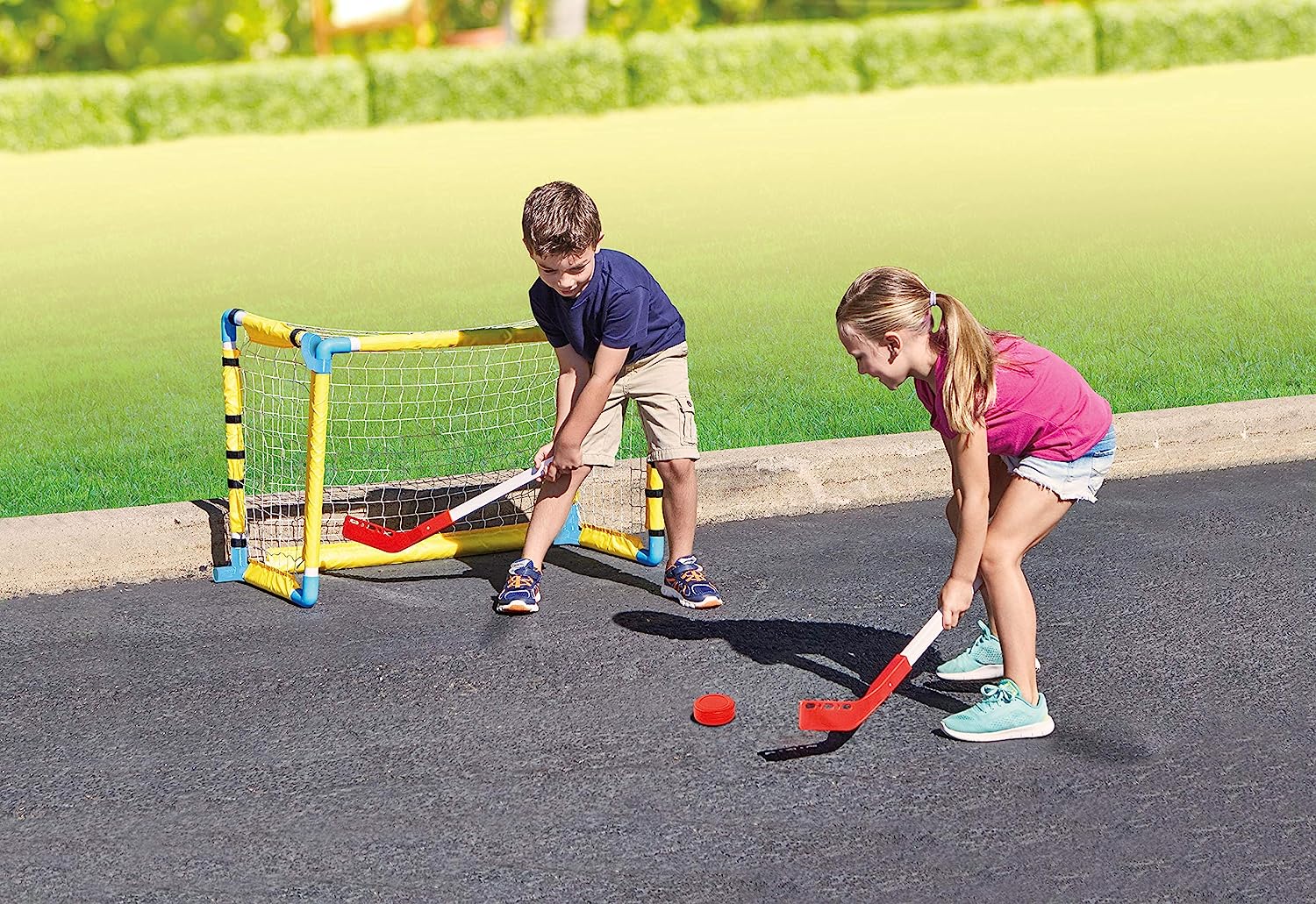 Picture of kids playing hockey.