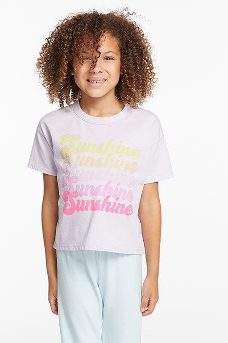 Model image of girl in a light purple t-shirt with the phrase Sunshine on the front in an ombre effect