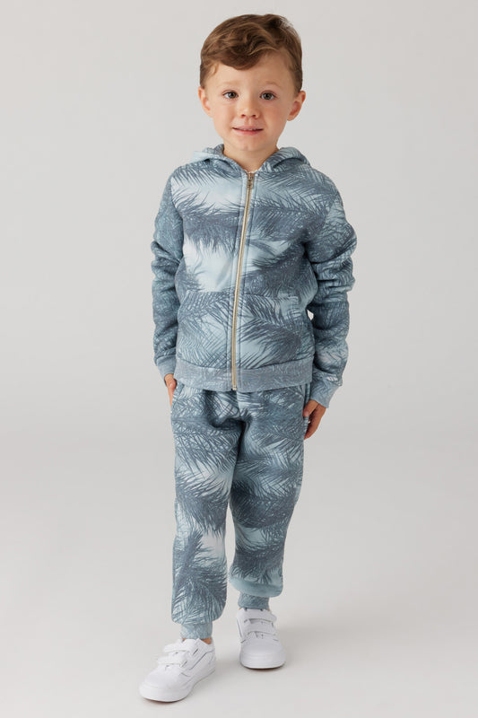 Model image of zip up sweatsuit with a palm tree design 