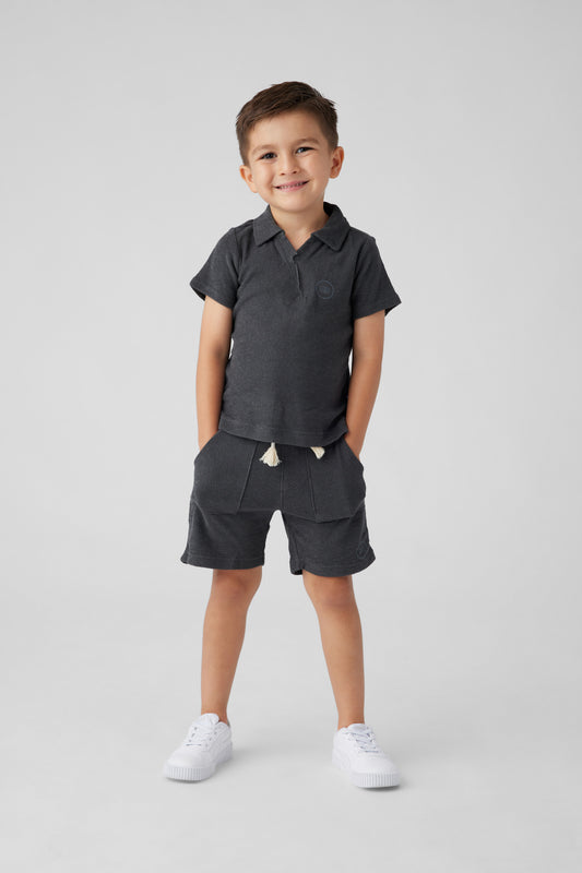 Model image, black polo and short set 