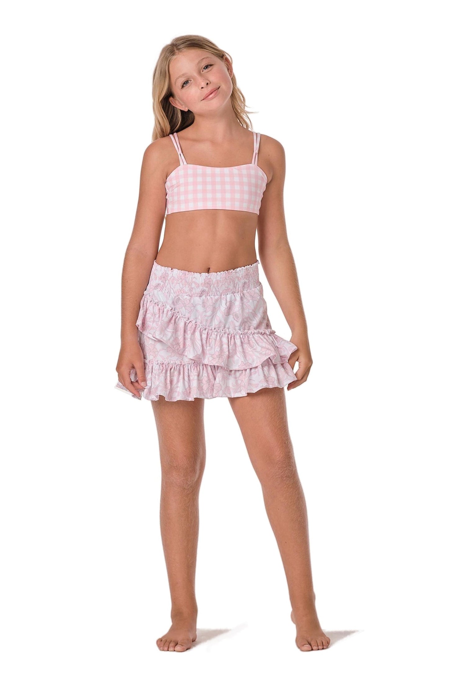 Model image of a light pink ruffled skirt