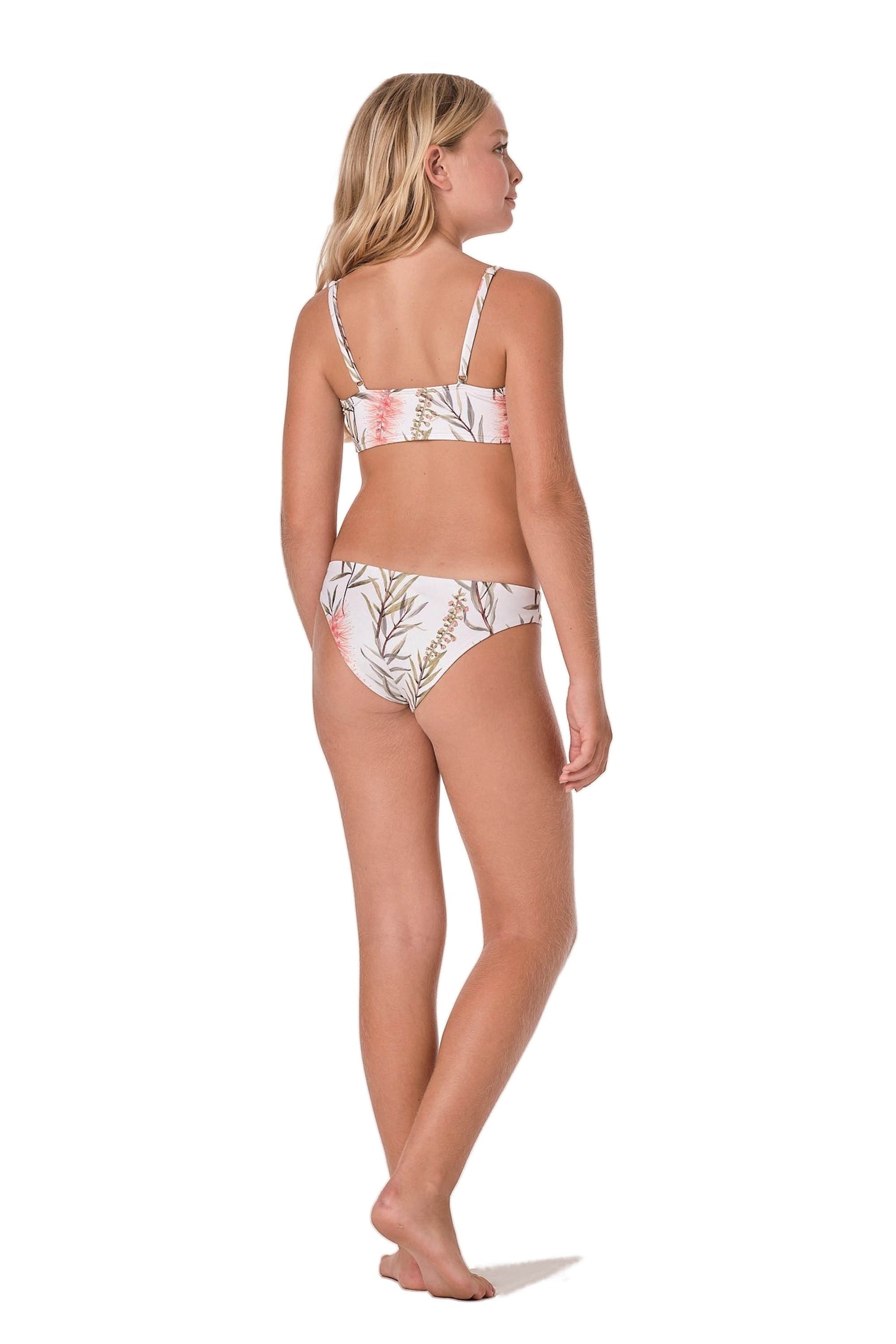 Model image of bikini set. Design is white with floral/paradise look.